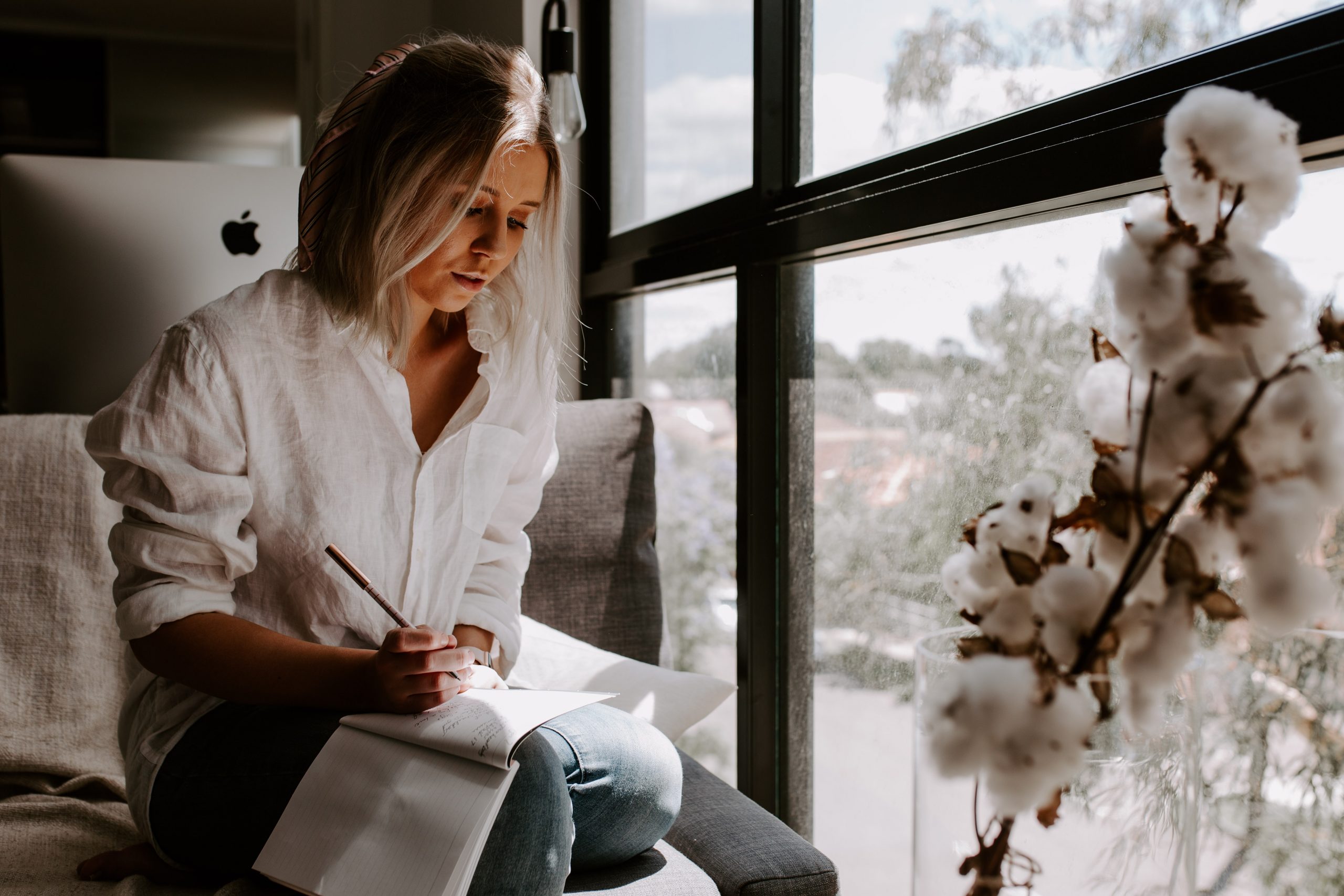 a lady writing down